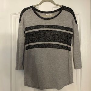Maurices size medium top. Gray and black